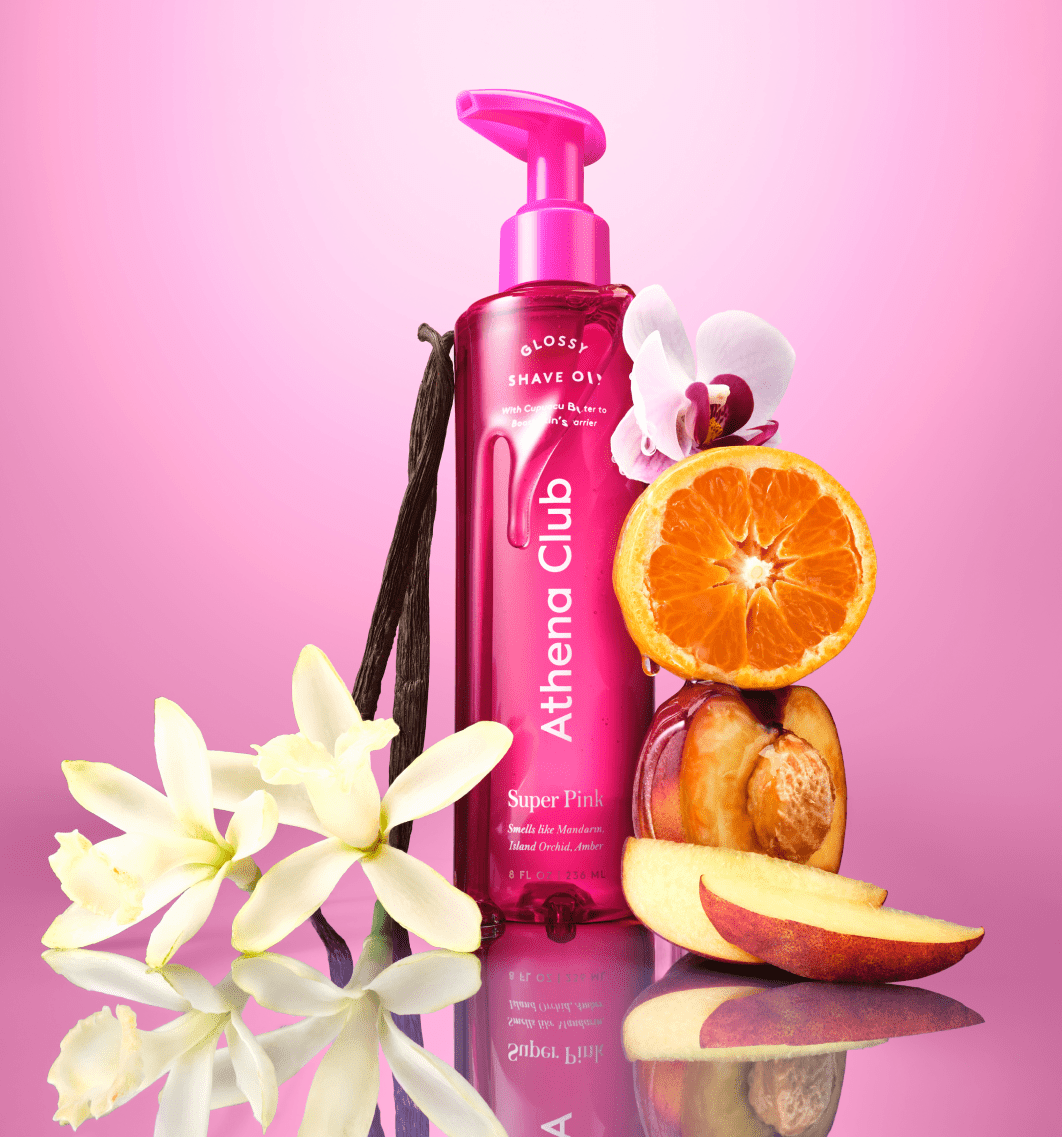 Athena Club Glossy Shave Oil Super Pink 236ml with vanilla flowers, orchid, orange and peach fragrance imagery