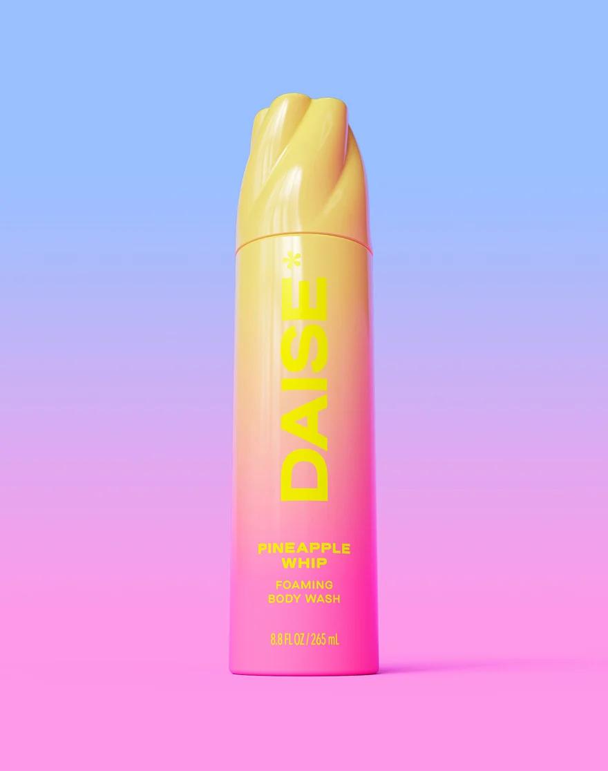 Daise Pineapple Whip Foaming Body Wash 265ml – front product view on a blue and pink background