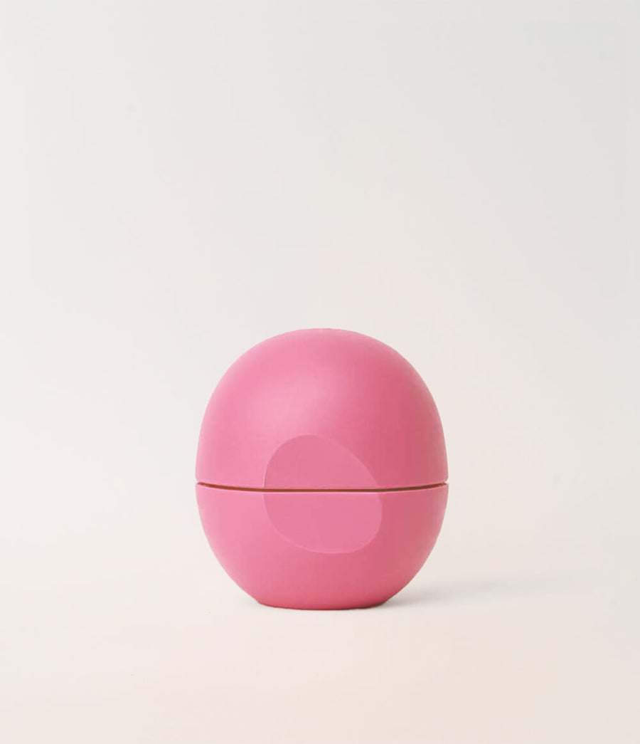 HAMYNAT eos organic strawberry sorbet lip balm in a signature pink sphere container for hydrated and soft lips