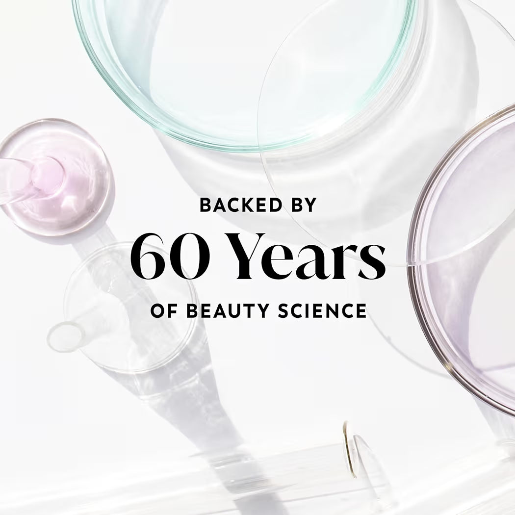 HAMYNAT Olay body wash advertisement featuring laboratory glassware and the text Backed by 60 Years of Beauty Science.