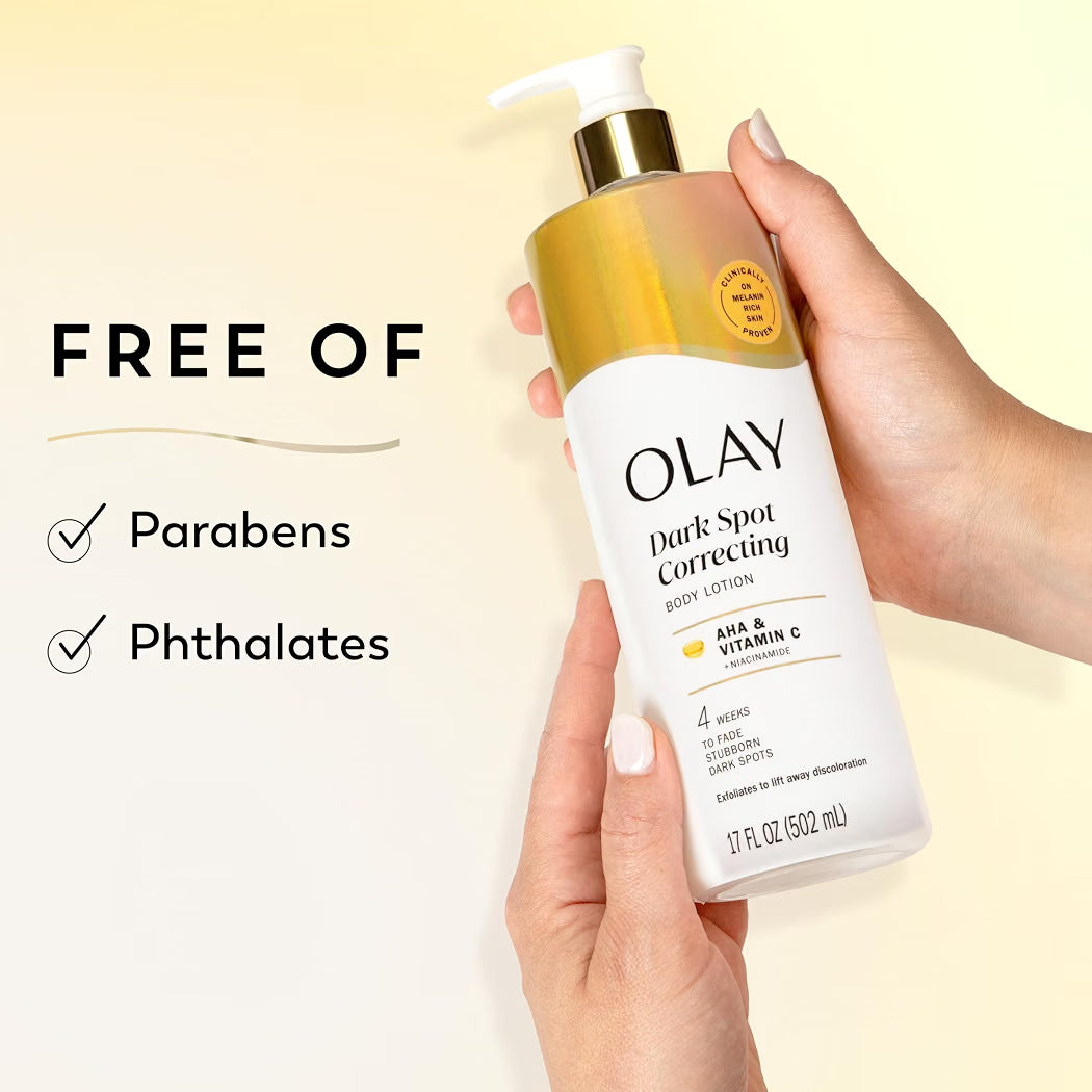 HAMYNAT Olay Dark Spot Correcting Body Lotion bottle held in hand, featuring AHA, Vitamin C, and Niacinamide formula.