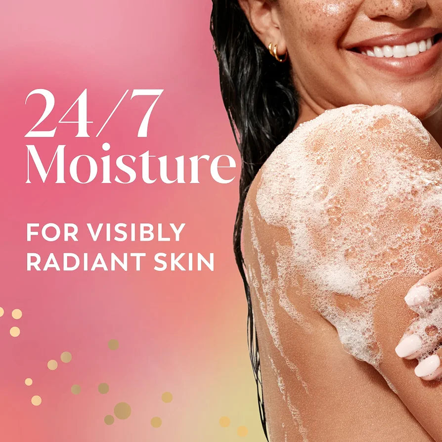 HAMYNAT Olay Melon Spritz body wash creating a rich lather on a woman's shoulder for radiant, hydrated skin.