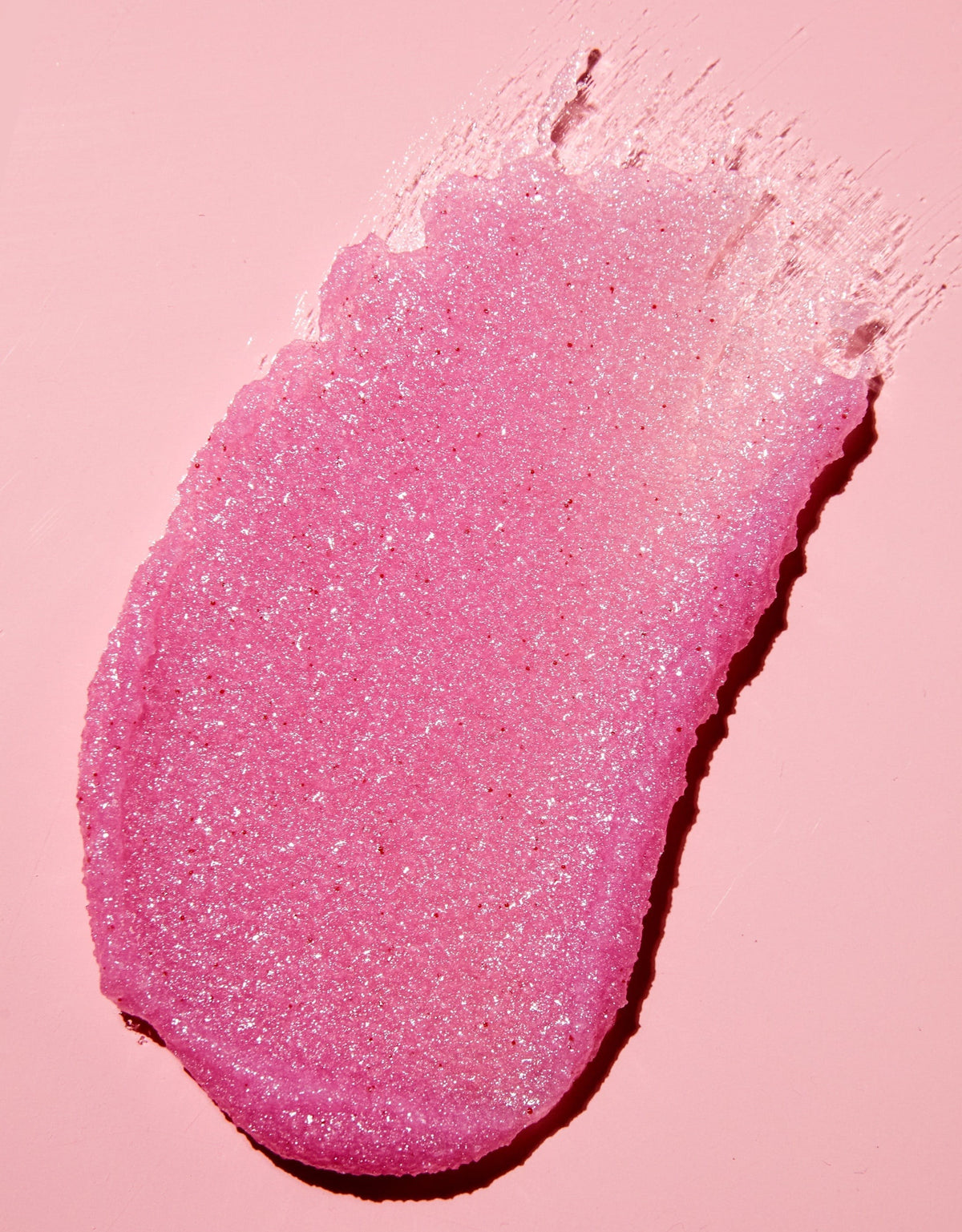 HAMYNAT Tree Hut Cotton Candy sugar scrub texture swatch showing a vibrant pink exfoliating paste on a pink background