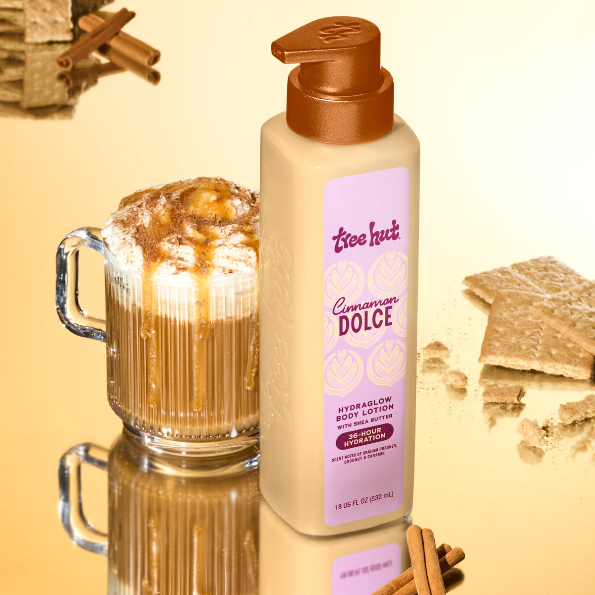 Tree Hut Cinnamon Dolce Hydraglow Body Lotion beside a cinnamon drink