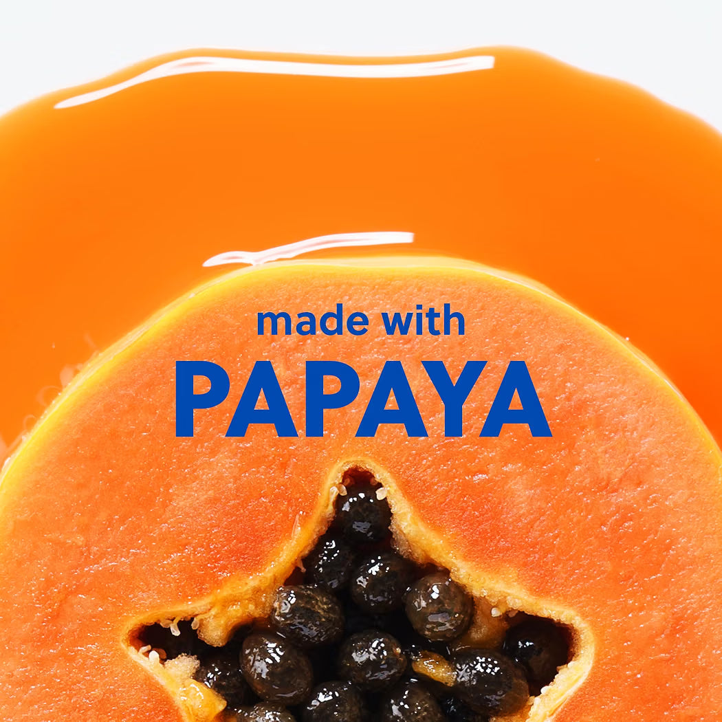 HAMYNAT Tree Hut Papaya Paradise sugar scrub featuring a fresh halved papaya with vibrant orange flesh and seeds