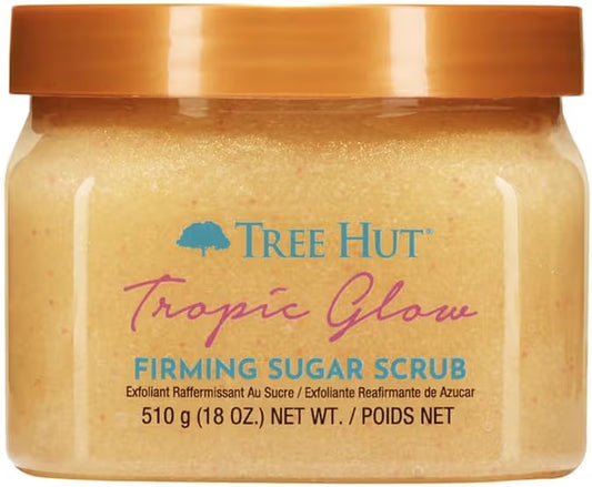 HAMYNAT Tree Hut Tropic Glow firming sugar scrub in a clear jar with a gold lid for body exfoliation.