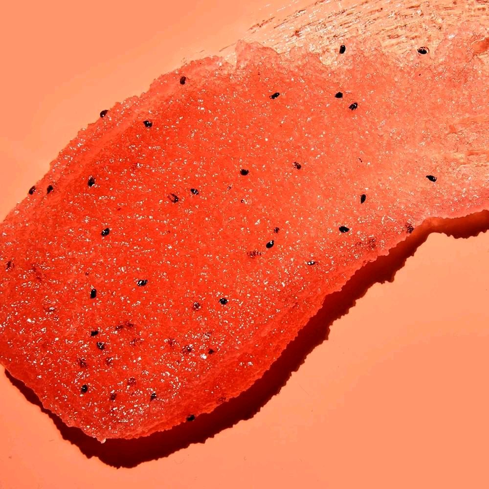 HAMYNAT Tree Hut Watermelon Shea Sugar Scrub texture showing vibrant red exfoliating sugar grains with black seeds